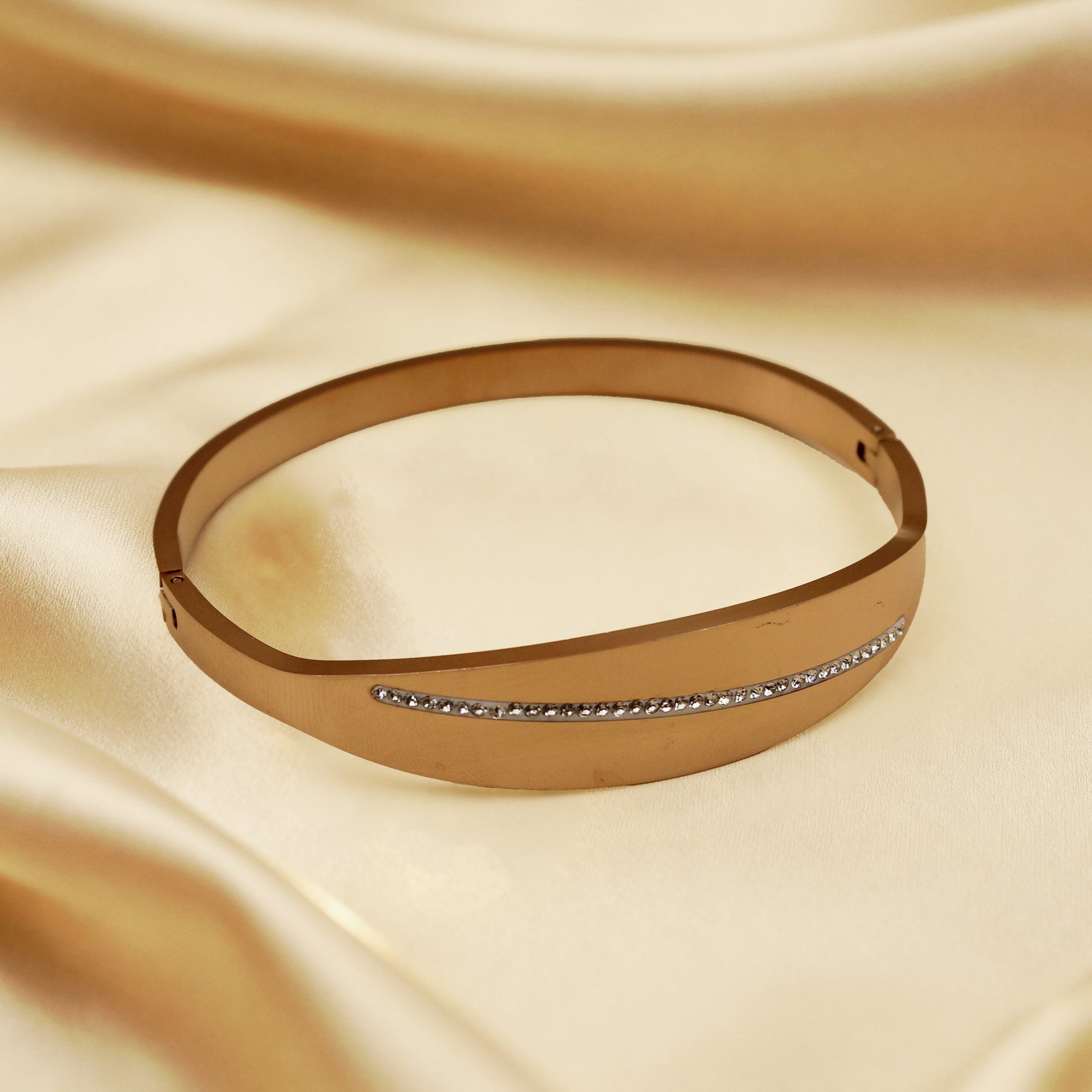 Contemporary Gold Tone Bangle with Subtle Sparkle