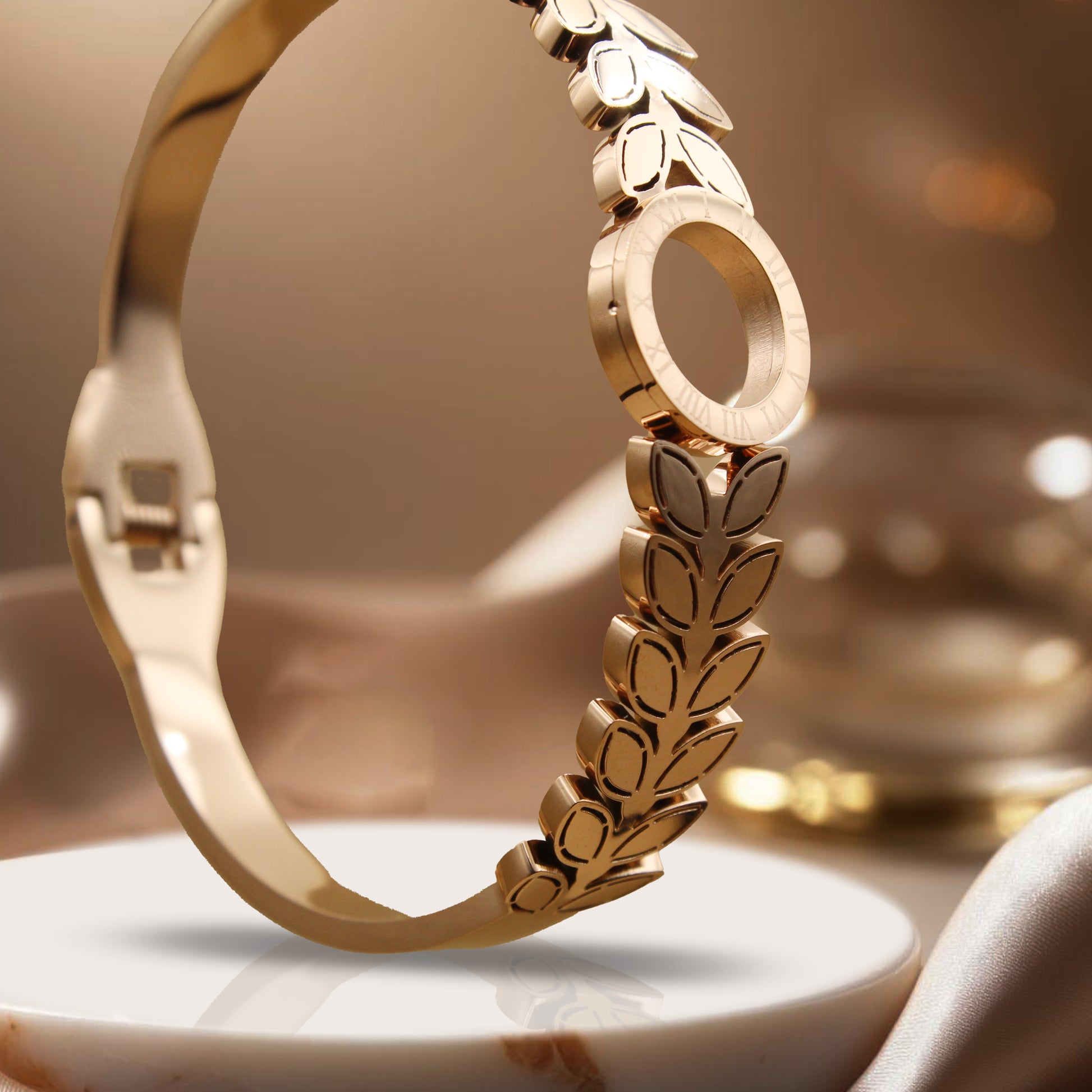 Modern Gold Finish Leaf Pattern Bangle with Circular Centerpiece