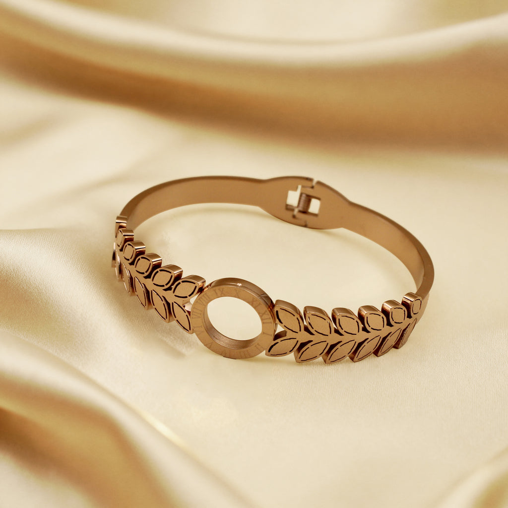 Modern Gold Finish Leaf Pattern Bangle with Circular Centerpiece